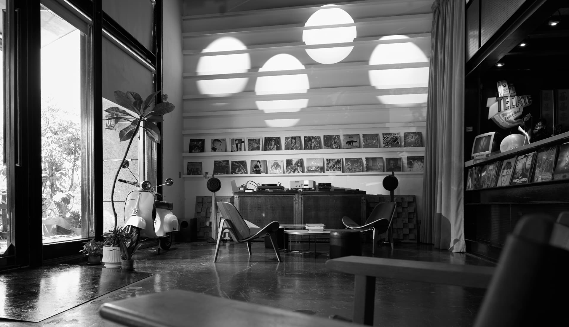 A wide view of the A39-1 space: polished floors, a long curtain wall, and open floor for gatherings